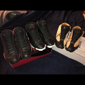 3pairs of Jordan 13s